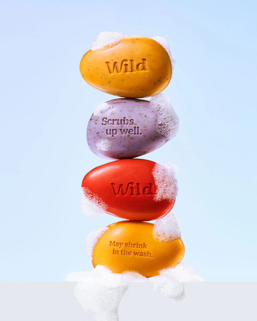 Caption: a stack of three candy balls sitting on top of each other
