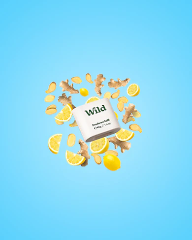 Caption: a bunch of lemons and lemon slices on a blue background