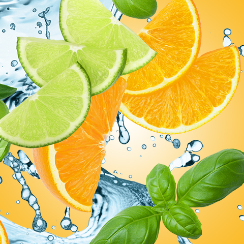 Didascalia: un mazzo di arance e lime con l'acqua che schizza intorno a loro