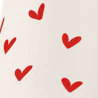 Caption: a bottle of wine with hearts drawn on it