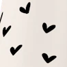 Caption: a black and white photo of a pen and paper with hearts drawn on it