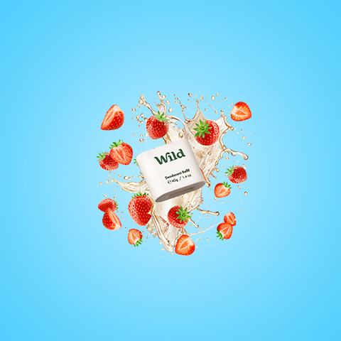 Caption: a box of wild with strawberries falling into it