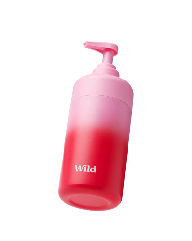 Caption: a pink bottle with a red cap and the word wild on it