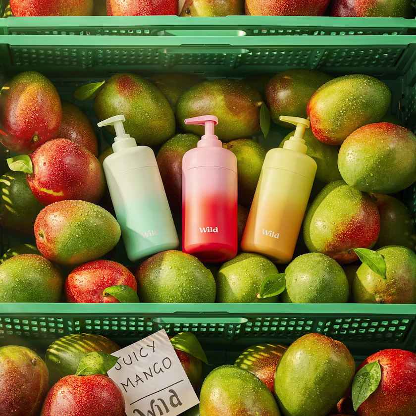 Caption: a display of apples, pears, and hand soaps