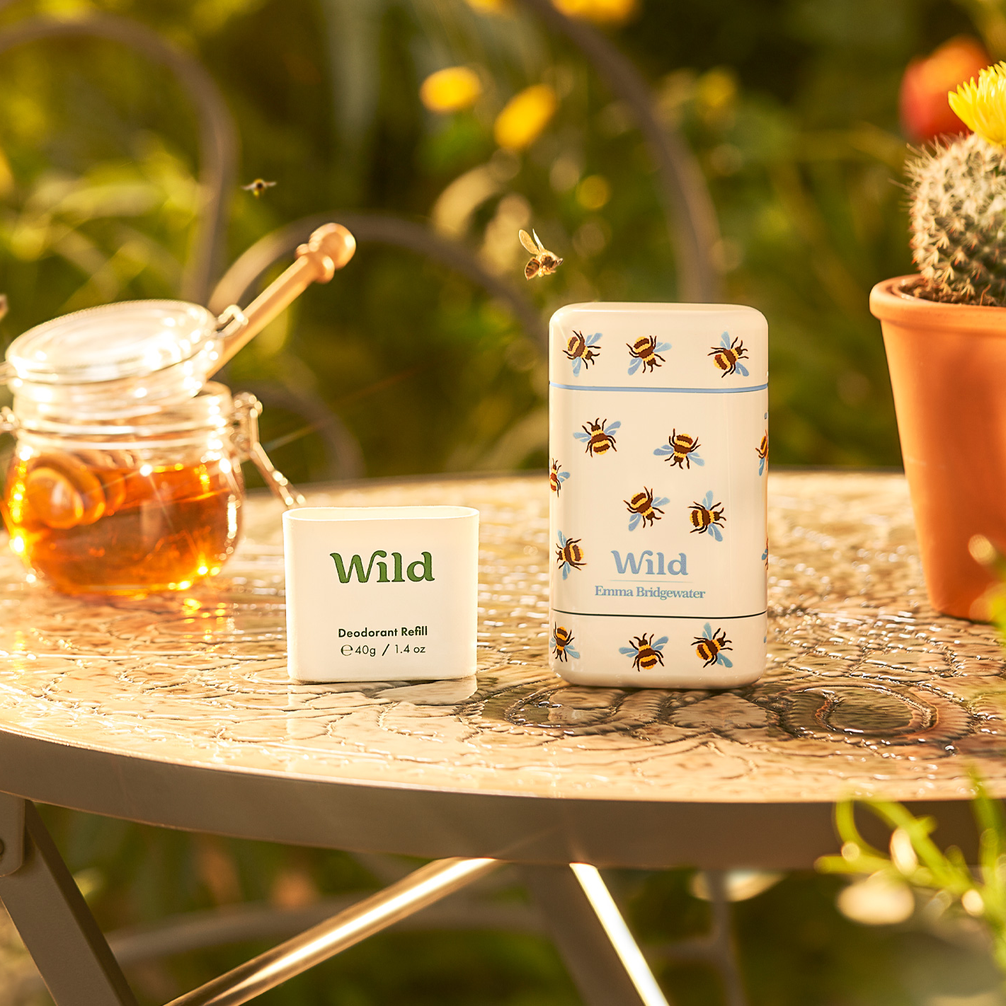 Caption: a table topped with a jar of honey next to a jar of honey