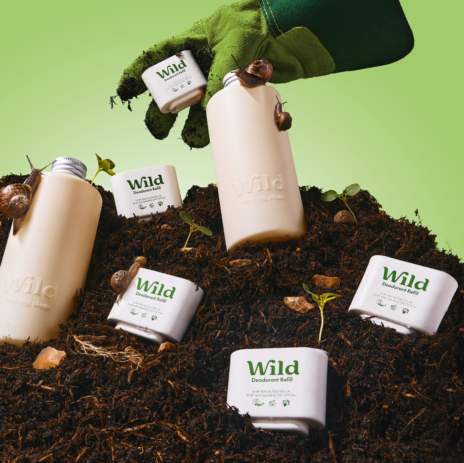 Caption: a hand is holding a can of wild tea