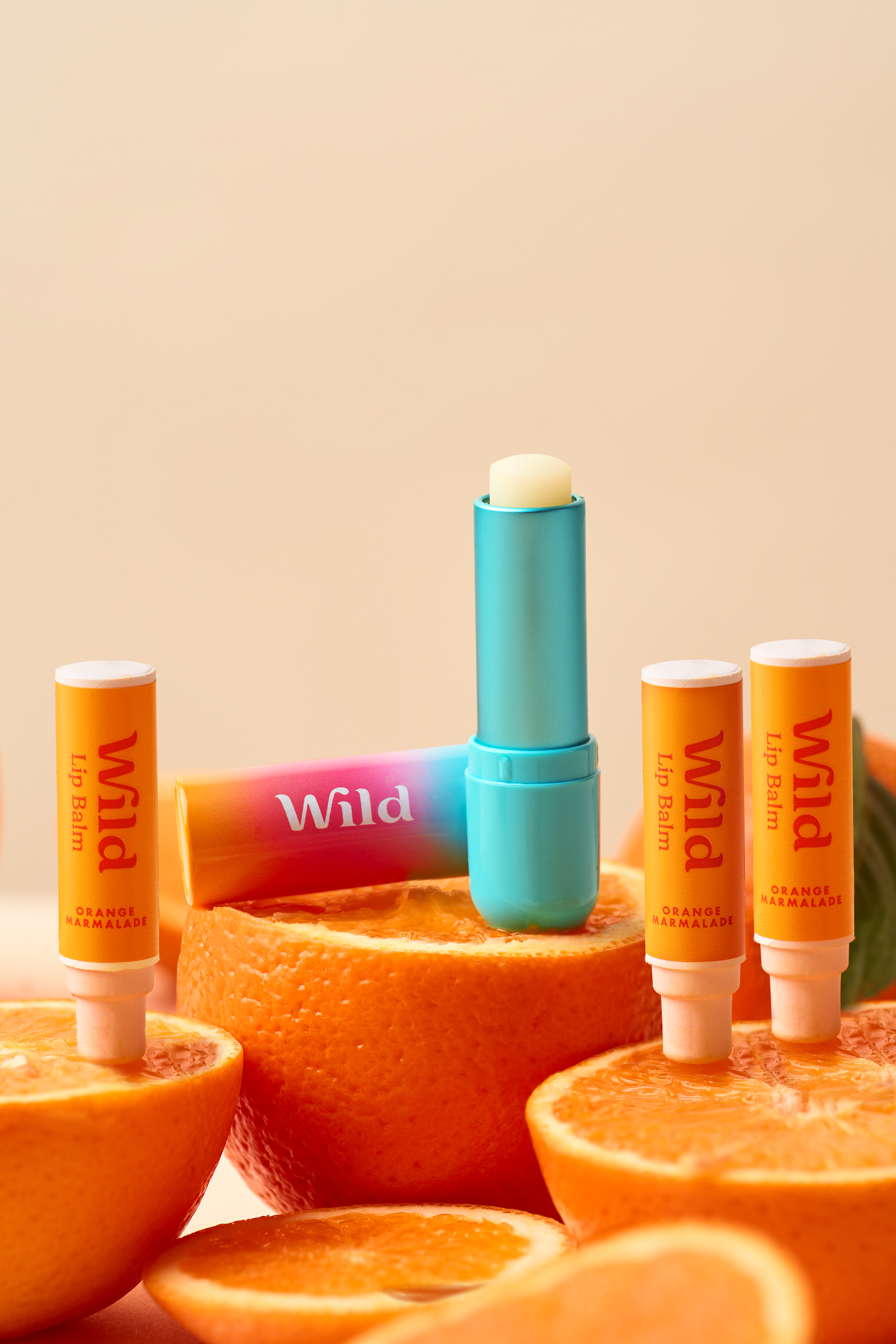 Caption: a group of oranges with lip bales on them