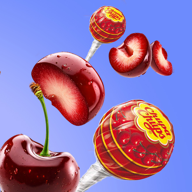 Légende : une sucette rouge avec une cerise sur le dessus