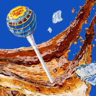 Caption: a lollipop with ice cubes floating around it