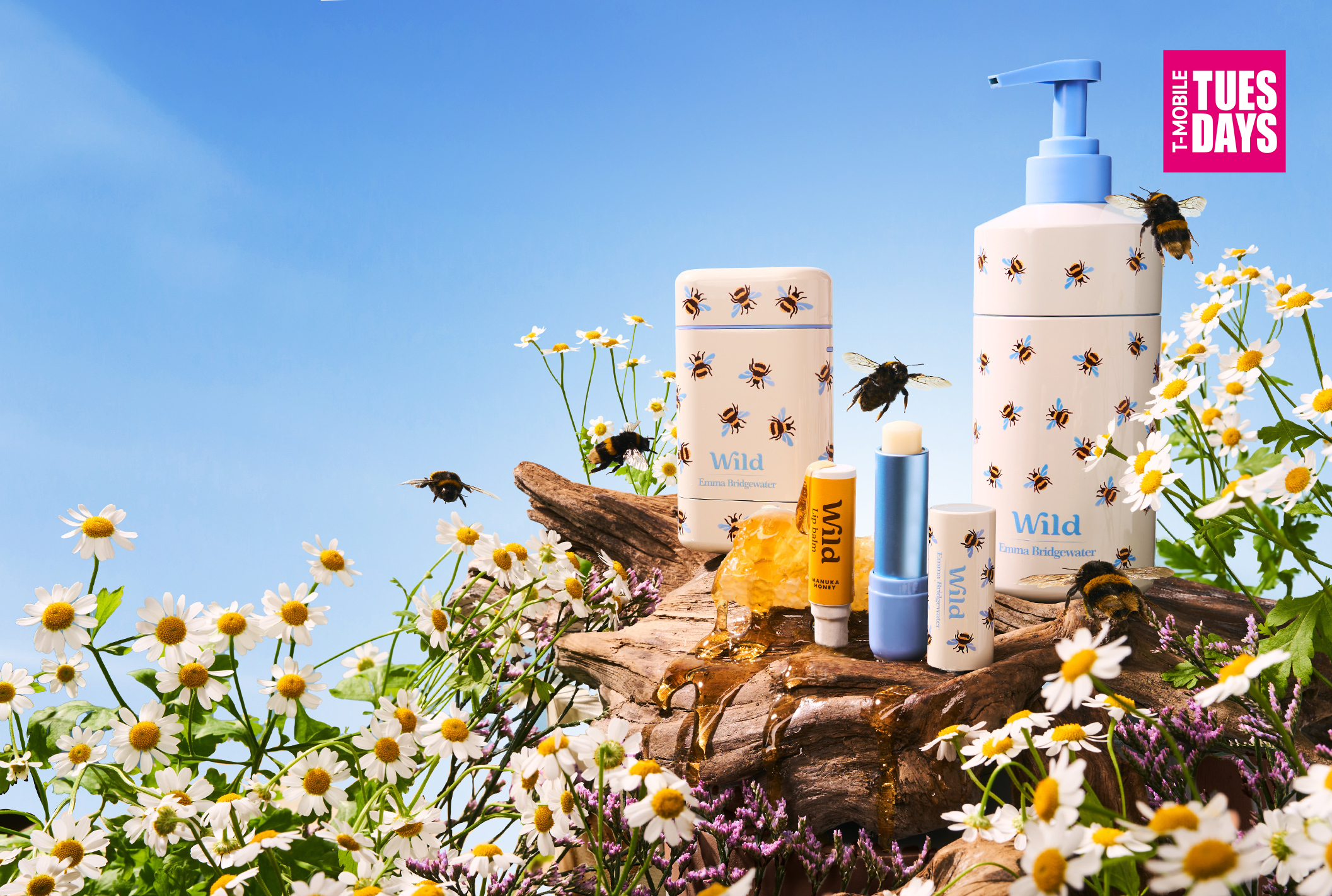 Caption: a couple of bottles of lotion sitting on top of a tree stump