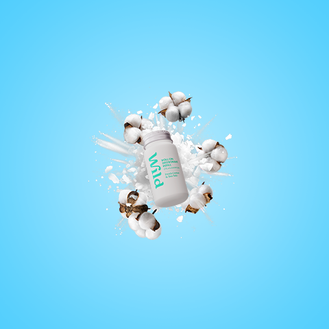 Caption: a bottle of pills falling into a pile of milk