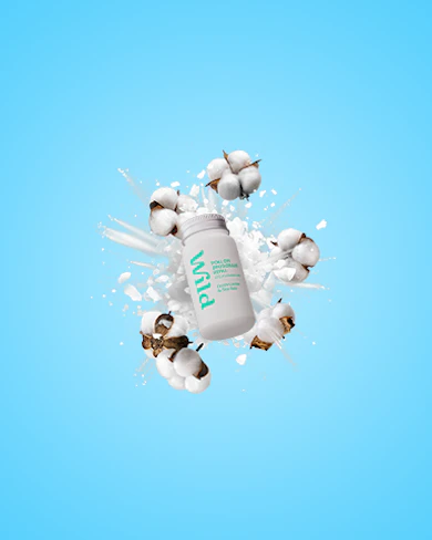 Caption: a bottle of pills falling into a pile of milk