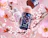 Caption: a pink background with flowers and two jars