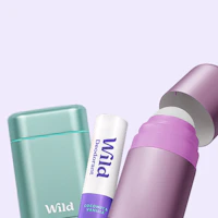 Caption: three different types of lip balm on a table