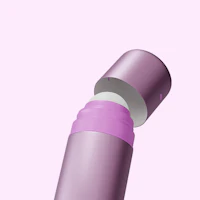 Caption: a close up of a purple and white object