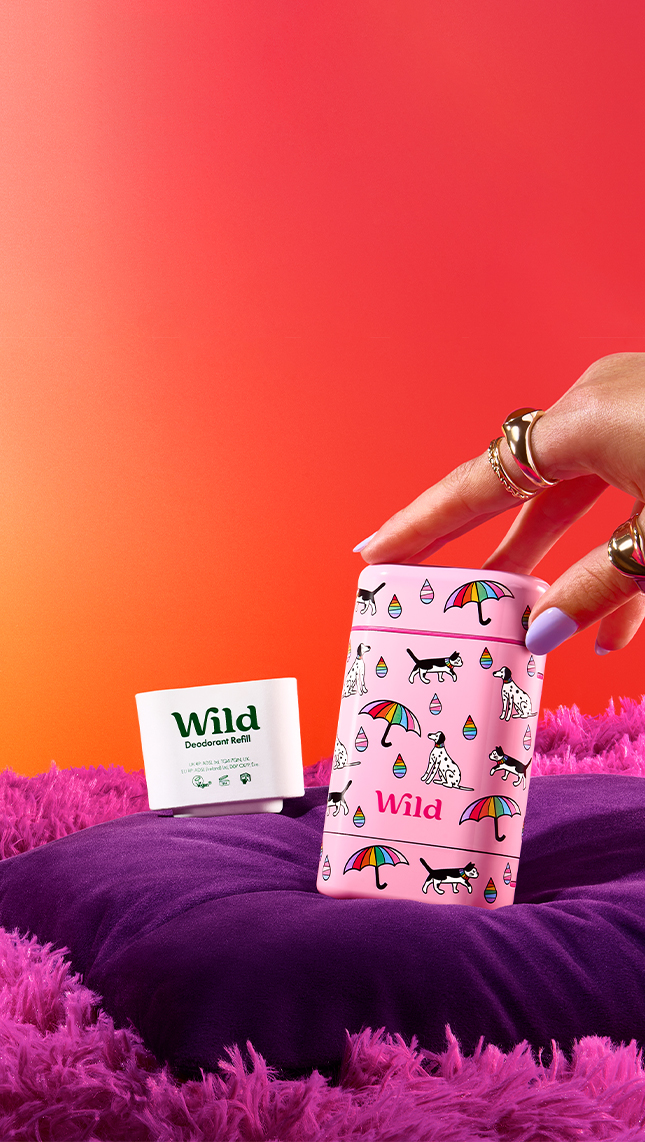 Caption: a woman's hand reaching into a pink gift bag