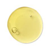 Caption: a close up of a yellow liquid in a bowl
