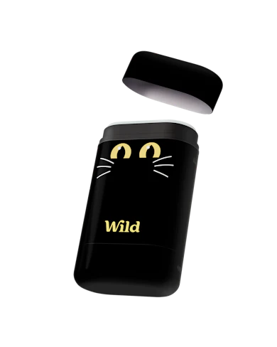 Caption: a black bottle with a cat face on it