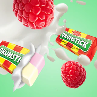 Caption: a raspberry and cream drink being poured into a carton of drumstick