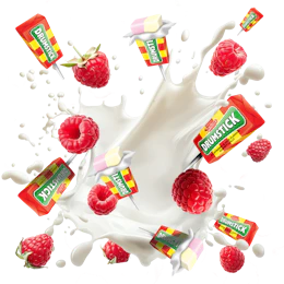 Caption: raspberries and milk splashing into a glass of milk