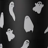 Caption: a can of soda with ghost stickers on it