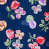 Caption: a blue background with a bunch of flowers on it