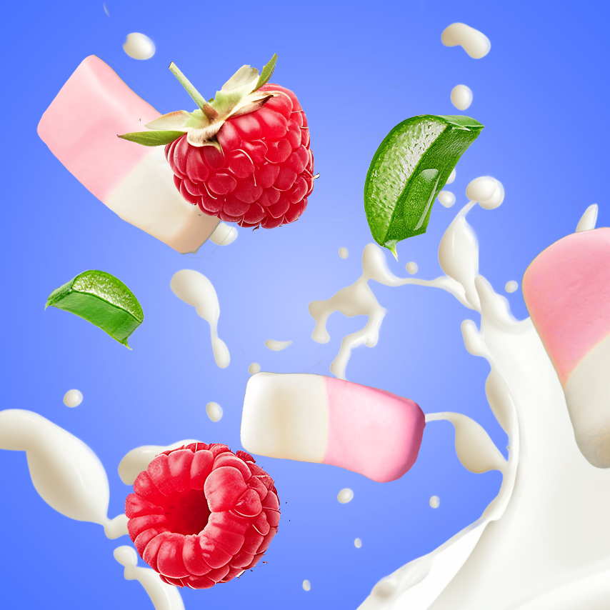 Légende : photo d'une fraise, d'une framboise, d'une menthe et d'une éclaboussure de lait.