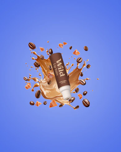 Caption: a tube of chocolate milk with coffee beans falling out of it
