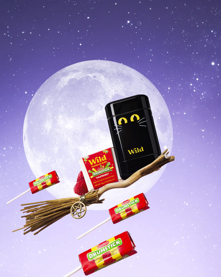 Caption: a picture of a cell phone and some candy on a stick