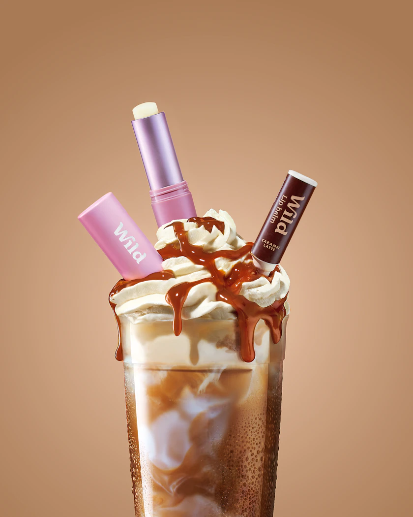 Caption: a chocolate milkshake with whipped cream and chocolate on top