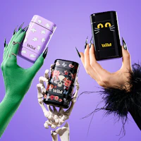 Caption: a person holding a cell phone in their hands