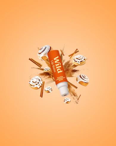Caption: a tube of toothpaste surrounded by donuts and cinnamons