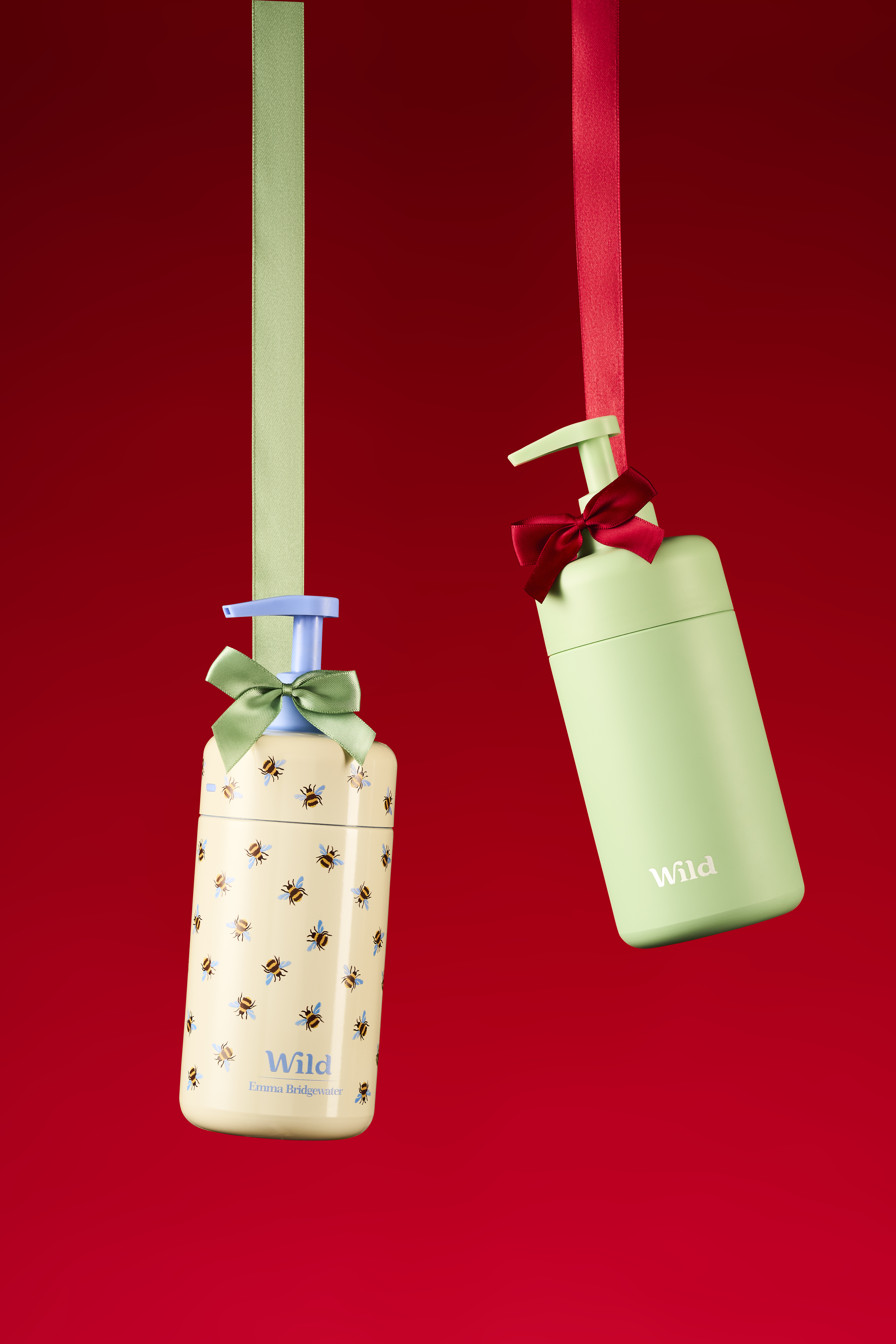 Caption: a couple of tags hanging from a red wall