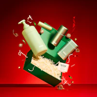 Légende : un fond rouge avec une boîte verte et quelques bouteilles