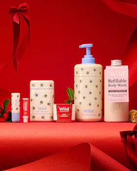 Caption: a variety of skin care products on a red background