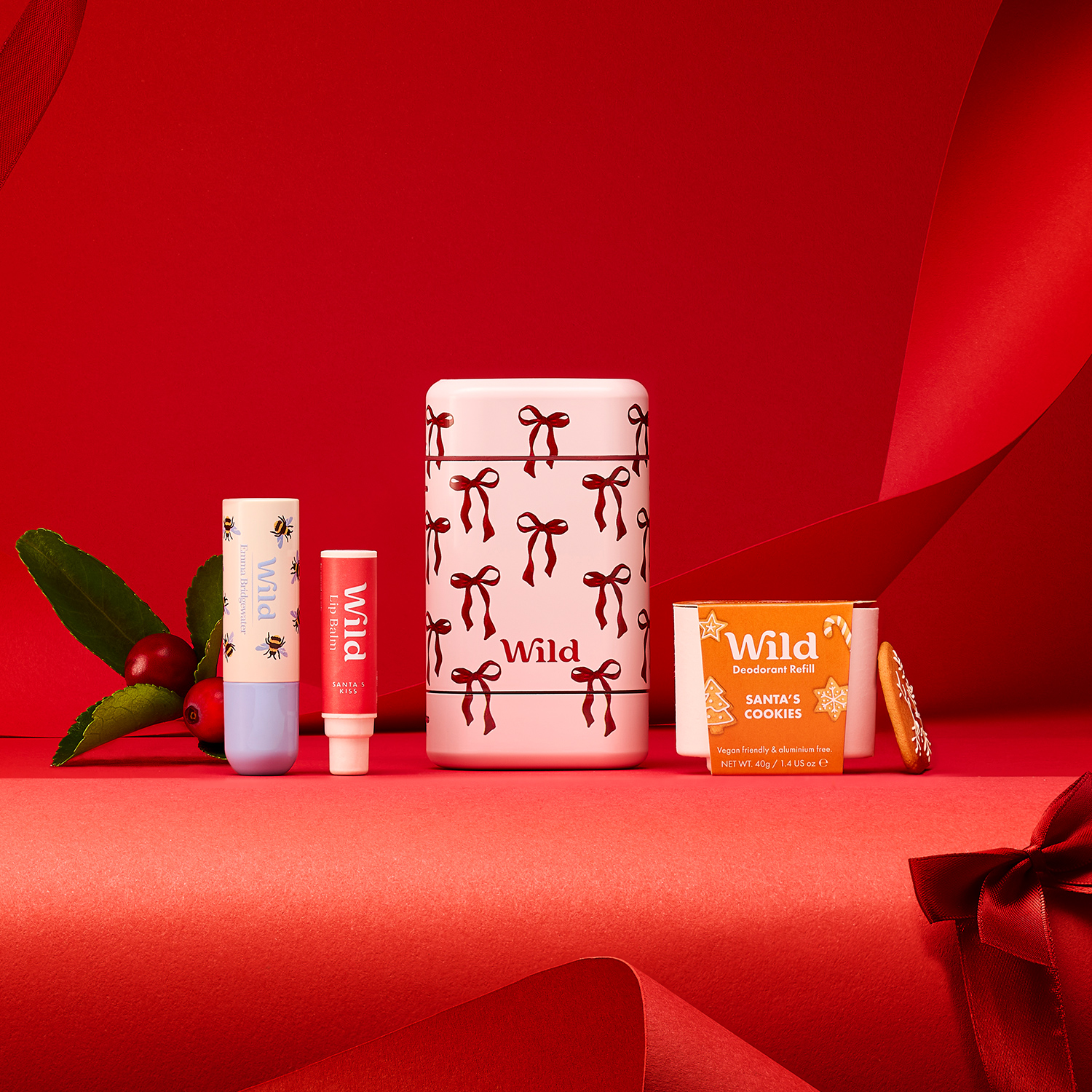 Caption: a group of different types of cosmetics on a red surface