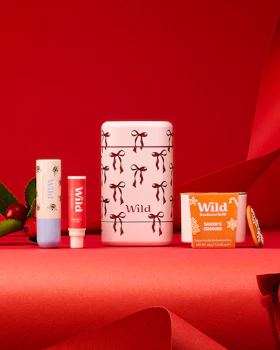 Caption: a group of different types of cosmetics on a red surface