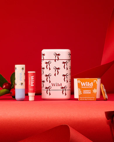 Caption: a group of different types of cosmetics on a red surface