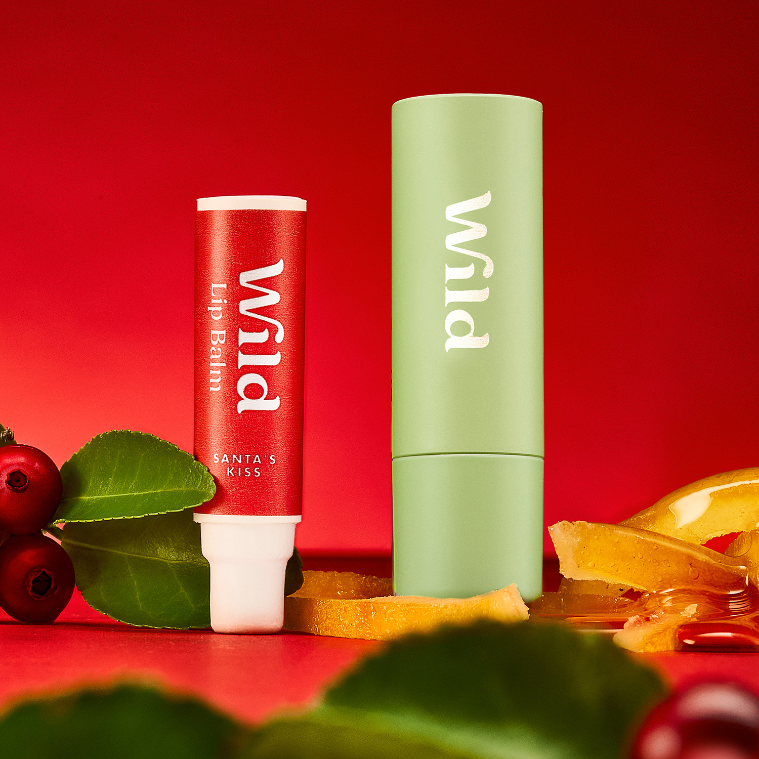 Caption: a lip bale next to a tube of lip bale