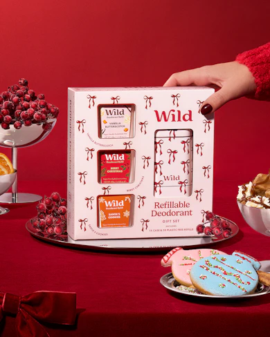 Caption: a person is holding a box of wild products
