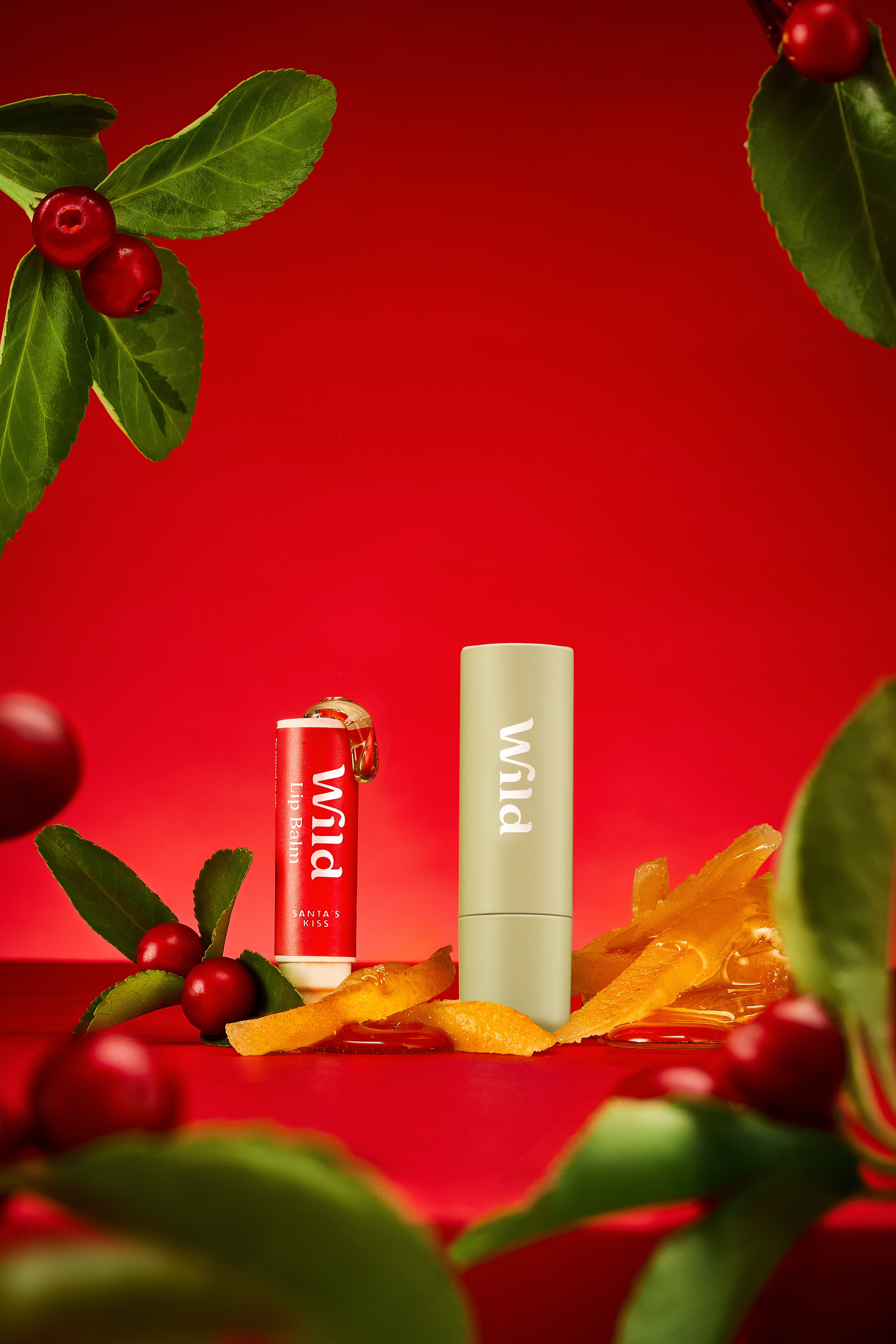 Caption: a lip bale next to a can of lip butter