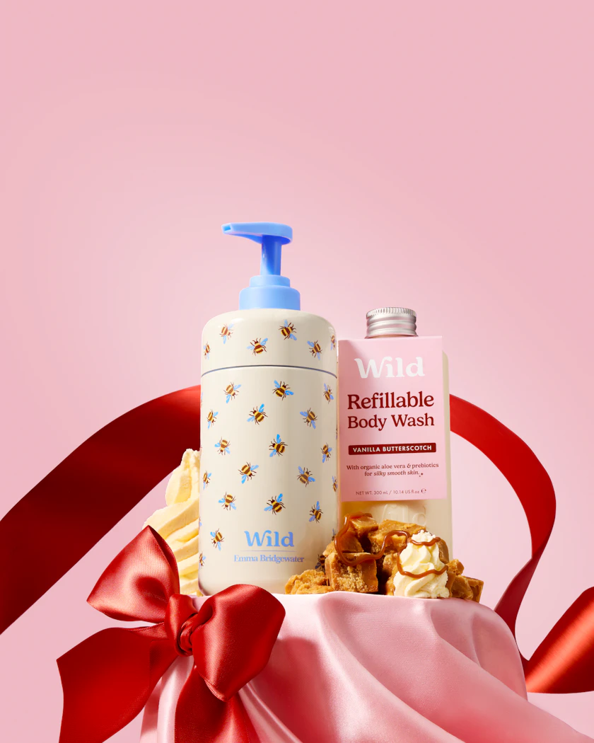 Caption: a bottle of soap and a lotion on a pink background