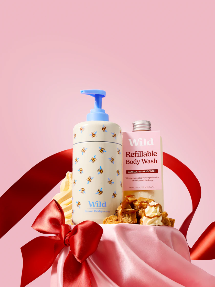 Caption: a bottle of soap and a lotion on a pink background