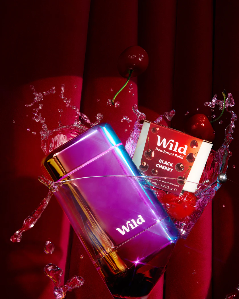 Caption: a glass filled with a drink and a box