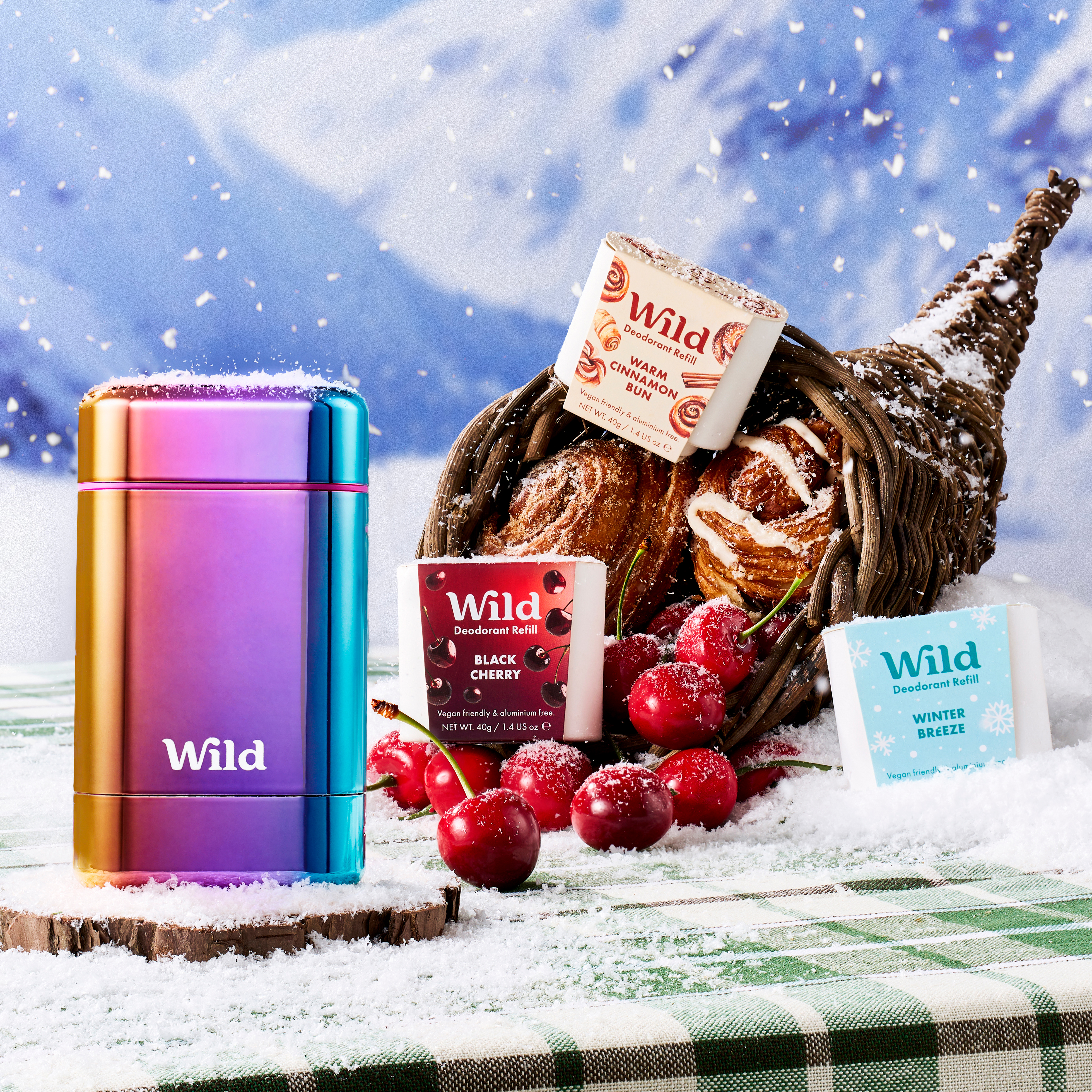 Caption: a basket of bread, cranberries, and other items on a table