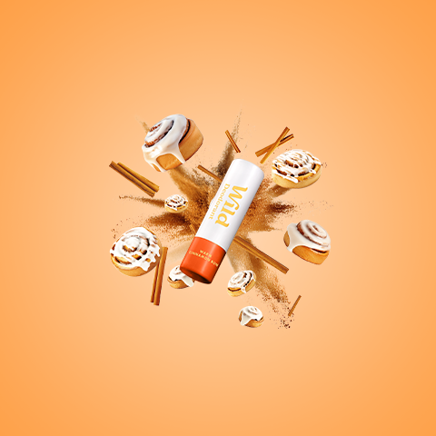 Légende : un tube de dentifrice entouré de beignets et de cannelle