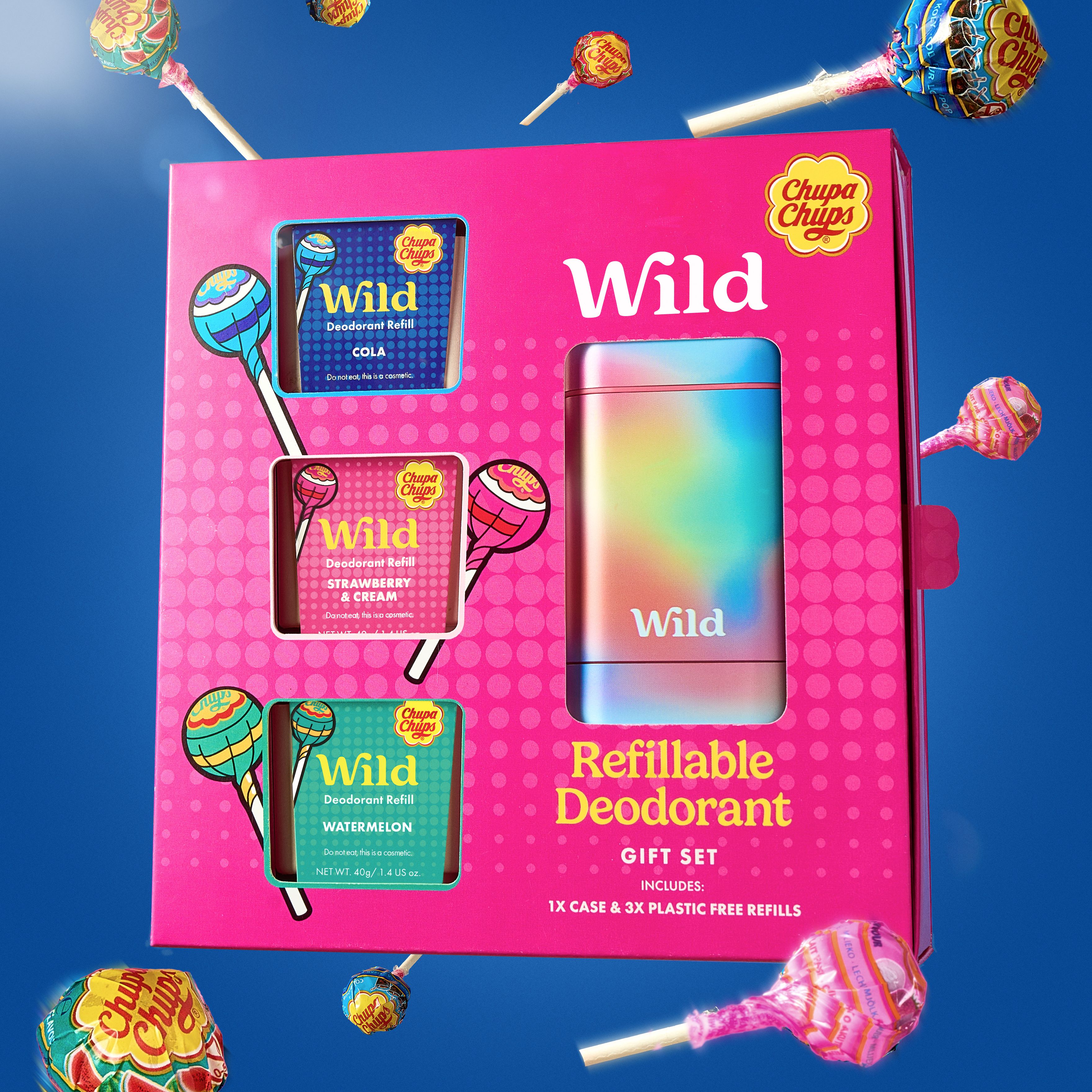 Caption: a pink box with candy and candies in it