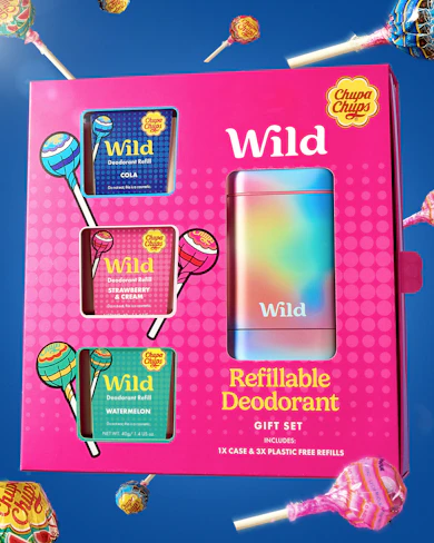 Caption: a pink box with candy and candies in it