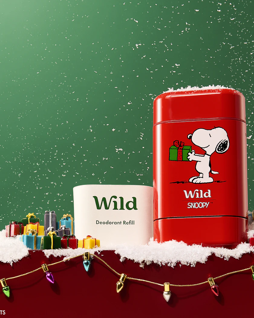 Caption: a red tin can with a christmas message on it
