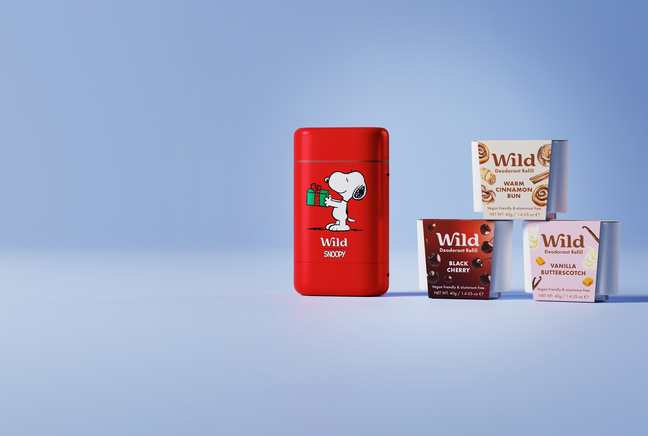 Caption: a red lighter sitting next to a couple of boxes